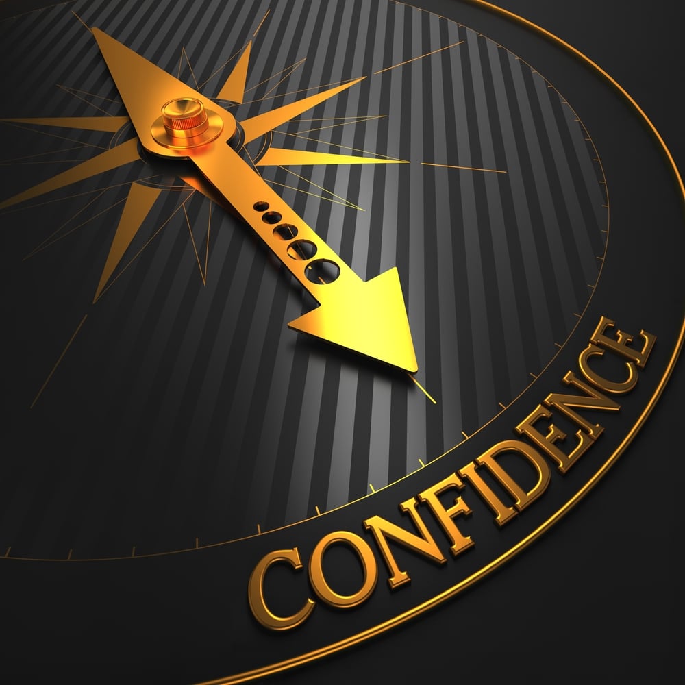 Confidence - Business Background. Golden Compass Needle on a Black Field Pointing to the Word Confidence. 3D Render.-1